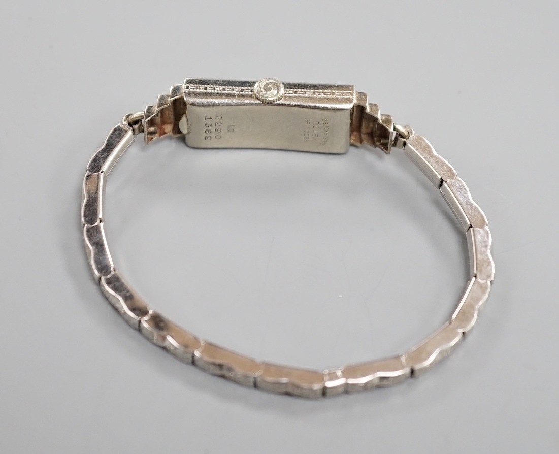 A lady's white metal and two stone diamond set C.R. Bucherer's Rolex Princess manual wind cocktail watch, case diameter 12mm.